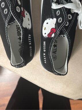 Hello Kitty Black Canvas Sneakers with White Laces and Red Bow Detail